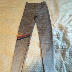 Peloton Gray Leggings with Vibrant Stripes
